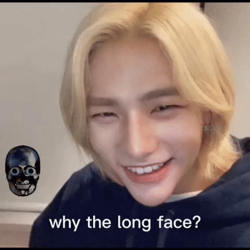 Blonde Young Man Smiling And Making Funny Face In Blue Hoodie GIF