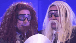 Blow Confetti To The Face Of Contestant  GIF