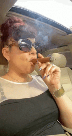 Blowing And Smoking Cigar Lady GIF