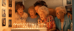 Blowing Numerous Candles Happy Birthday Old Lady  GIF