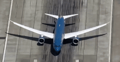Blue And White Airplane Taking Off From Runway GIF