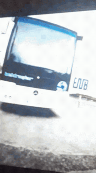 Blue And White Bus With Enub On Side GIF