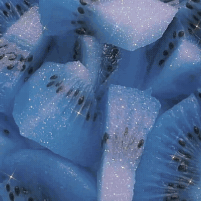 Blue And White Flowers Floating In Water GIF