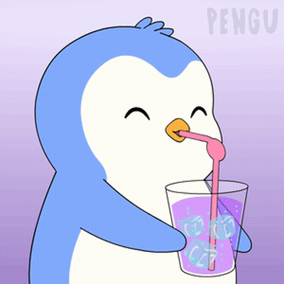 Blue And White Penguin Drinking Glass With Ice Cubes GIF