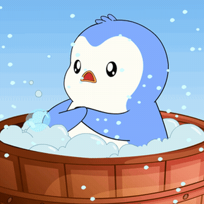 Blue And White Penguin Sitting In Wooden Tub GIF