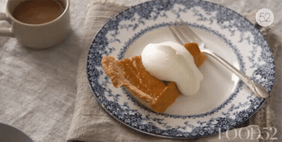 Blue And White Plate With Pumpkin Pie And Whipped Cream GIF