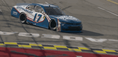 Blue And White Race Car With Smoke From Windshield GIF