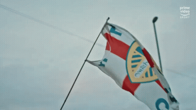 Blue And Yellow Leeds United Logo With Arms Crossed GIF