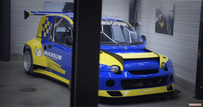 Blue And Yellow Race Car With Michelin GIF