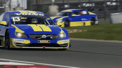 Blue And Yellow Volvo Race Car Number 13 GIF