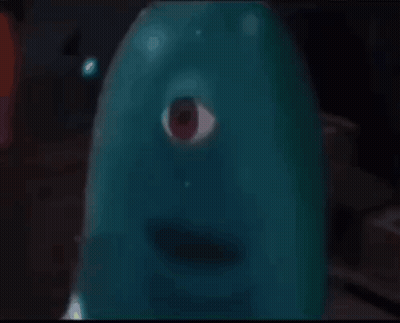 Blue Balloon With Red Eye Looking At Camera GIF