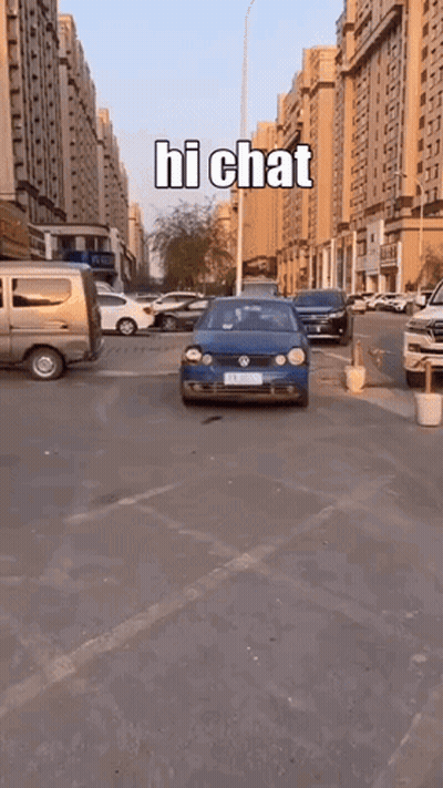 Blue Car Parked With Sign Saying Hi Chat GIF