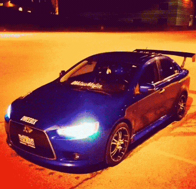 Blue Car With Mitsubishi Sticker GIF
