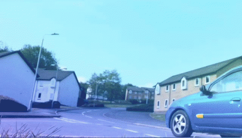Blue Car With Yellow Sticker GIF