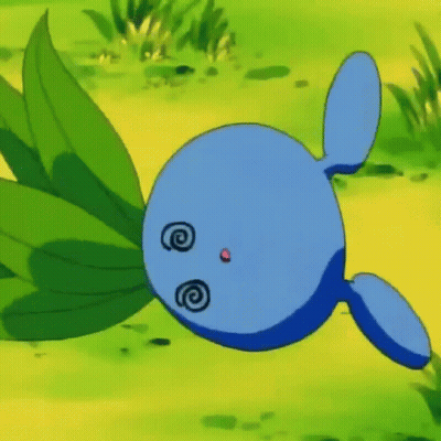 Blue Cartoon Character Laying on Green Leaf