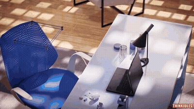Blue Chair in Front of Desk With Laptop Saying Think Jules