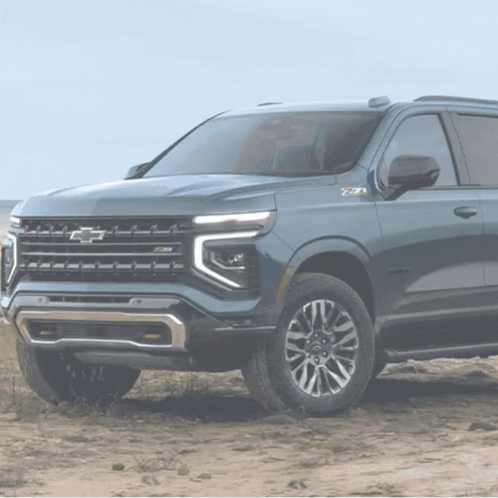 Blue Chevrolet SUV Parked On Dirt Road GIF