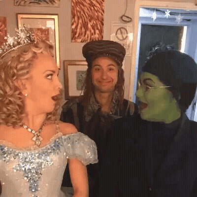 Blue Dress Woman Hat Man Green Mask Woman GIF