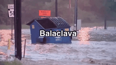 Blue Dumpster Floating In Flooded Area Saying Balaclava GIF
