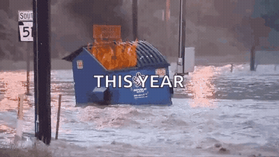 Blue Dumpster On Fire In Flooded Area With This Year GIF
