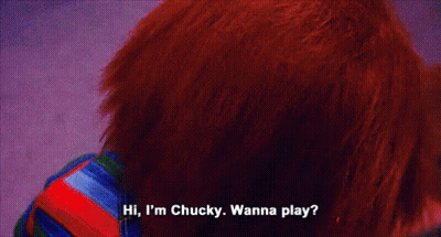 Blue-Eyed Doll Smiling Hi I'm Chucky Wanna Play GIF