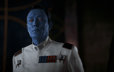 Blue Face Man With Red Eyes And White Uniform GIF