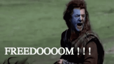 Blue-Faced Man Holding Sword Says Freedom GIF