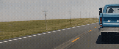 Blue Ford Truck Driving On Highway GIF