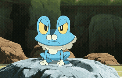 Blue Frog With Yellow Eyes Sitting On Rock GIF