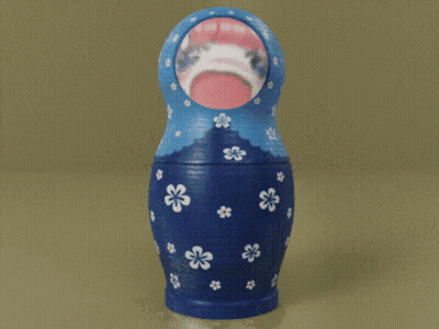 Blue Green And Orange Nesting Doll With White Flowers GIF