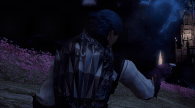 Blue-Haired Man In Pink Flower Field At Night GIF