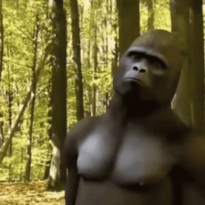 Blue-Haired Man Sitting Shirtless On Couch GIF