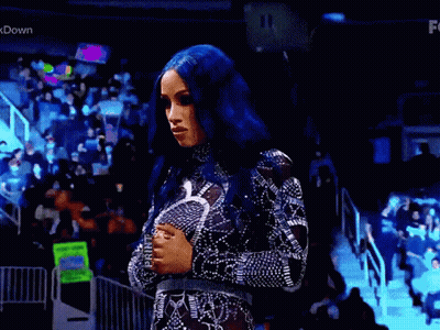 Blue-Haired Woman Before Crowd In Black-White Dress GIF