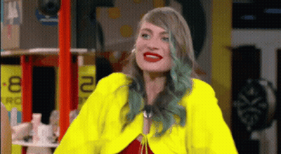 Blue-Haired Woman In Yellow Jacket Number 2 GIF