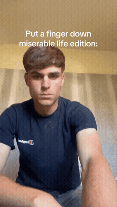 Blue-Haired Woman, Man Talking By Skull IPA Sign GIF