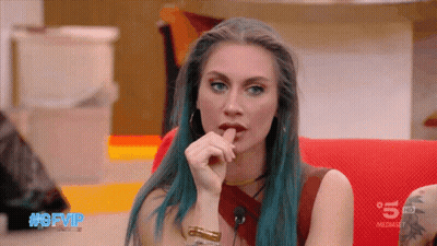 Blue-Haired Woman Sitting On Red Couch #Gfvip GIF