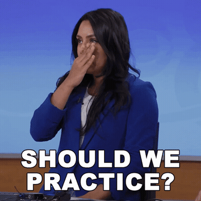 Blue Jacket Woman Covering Nose Saying Should We Practice GIF