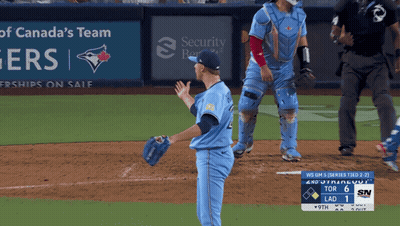 Blue Jays Pitcher On Mound In Front Of Security Bank Ad GIF