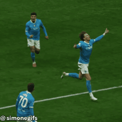 Blue Jersey Soccer Player Running Arms Outstretched GIF