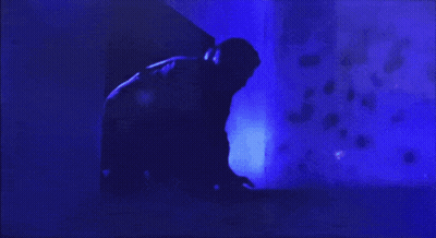 Blue Light Shining On Person's Head GIF
