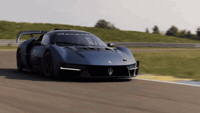 Blue Maserati Sports Car On Race Track GIF