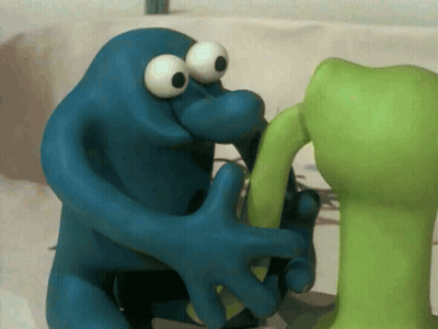Blue Monster Holding Green Object GIF