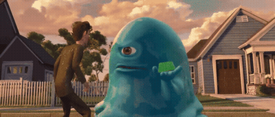 Blue Monster Holding Green Object GIF