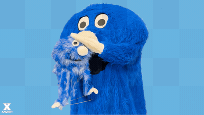 Blue Monster Holding Stuffed Animal Saying There There GIF