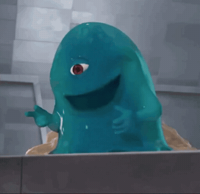 Blue Monster With White Eye Standing On Sand GIF