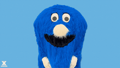 Blue Monster With White Face And Black Mustache With Letter X GIF