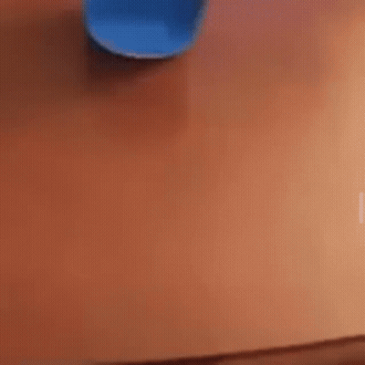 Blue Object Applied To Skin Close Up GIF