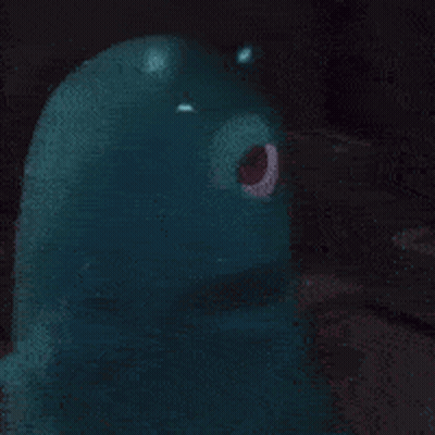 Blue Object With Red Eye On Black Background GIF