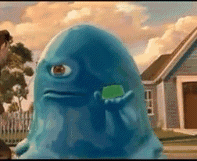 Blue One-Eyed Monster Holding Green Object GIF