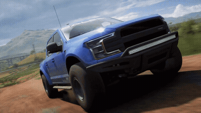 Blue Pickup Truck Driving Down Dirt Road GIF
